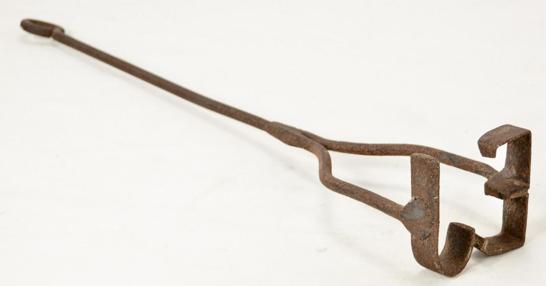 Vintage Branding Iron with Initials "EJ": A branding iron with the initials "EJ". Appears to be made of cast iron with some minor surface rust present throughout. Circa turn of the century. Measures 26.125"L x 4.25"W x 4"H. See photos.