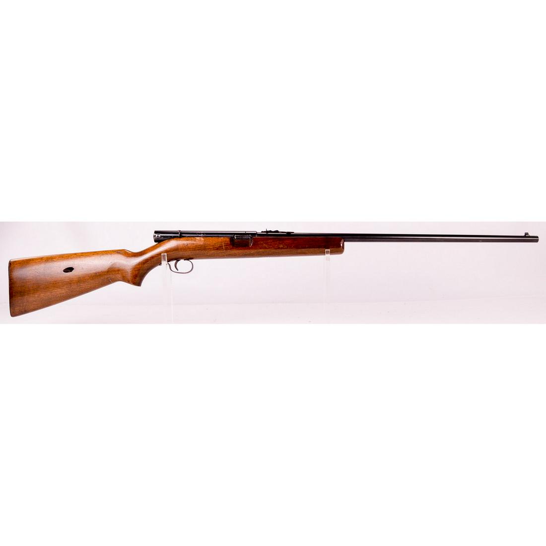 Winchester Model 74 Rifle .22LR SN: 76313 (M): A Winchester Model 74 semi automatic rifle with butt stock magazine chambered in .22LR. Rifle has 24" barrel with iron sights. Receiver finish has some scratches on side and near rear bolt. Barrel's b