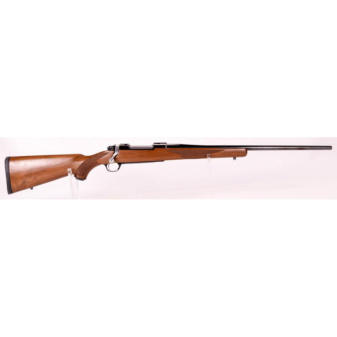 Ruger M77 Mark II RMEF Banquet Rifle .280 Rem (M): A Ruger M77 Mark II Rocky Mountain Elk Foundation banquet rifle chambered in .280 Remington. 24" barrel with receiver having scope rails. RMEF marking on floor plate. Beautiful checkered wood stock fi