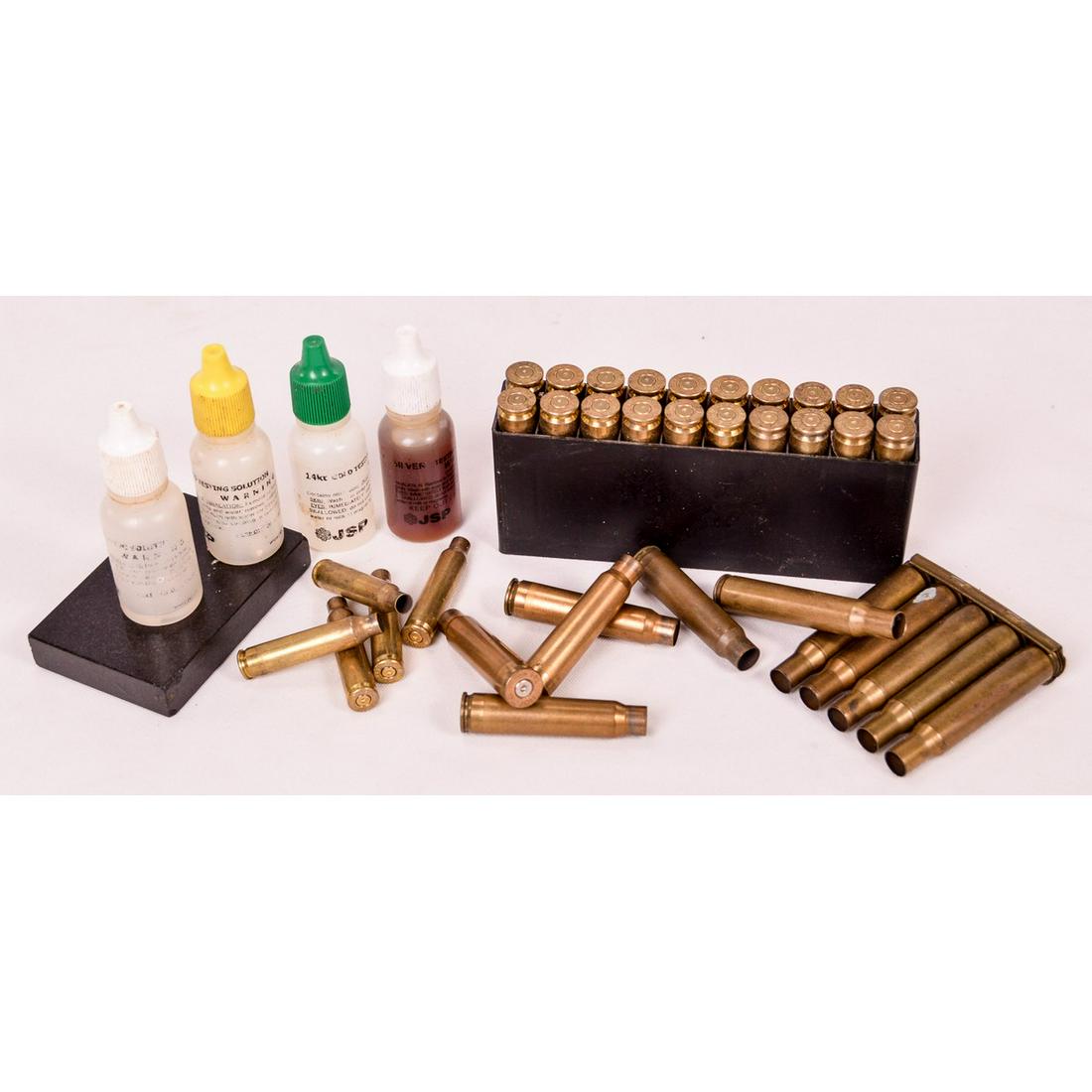 Lot of Reloading Brass & Ammo Boxes: Lot contains a bag of brass casings for 7.65x53 Argentine, a box of .243 Win brass, a bag of .223 Rem brass, a stripper clip of WRA 1917 .30-06 brass, and 10 empty boxes with cartridge holders for .30