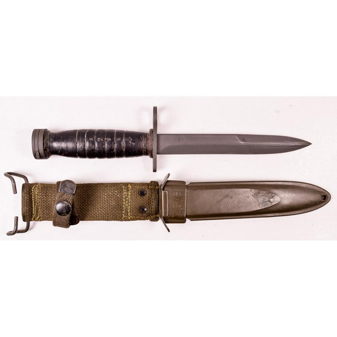 US M4 Bayonet: Stamped "PAL" on cross guard. Mint blade and cross guard added to worn leather washers. US M8 scabbard marked "BM&Co".