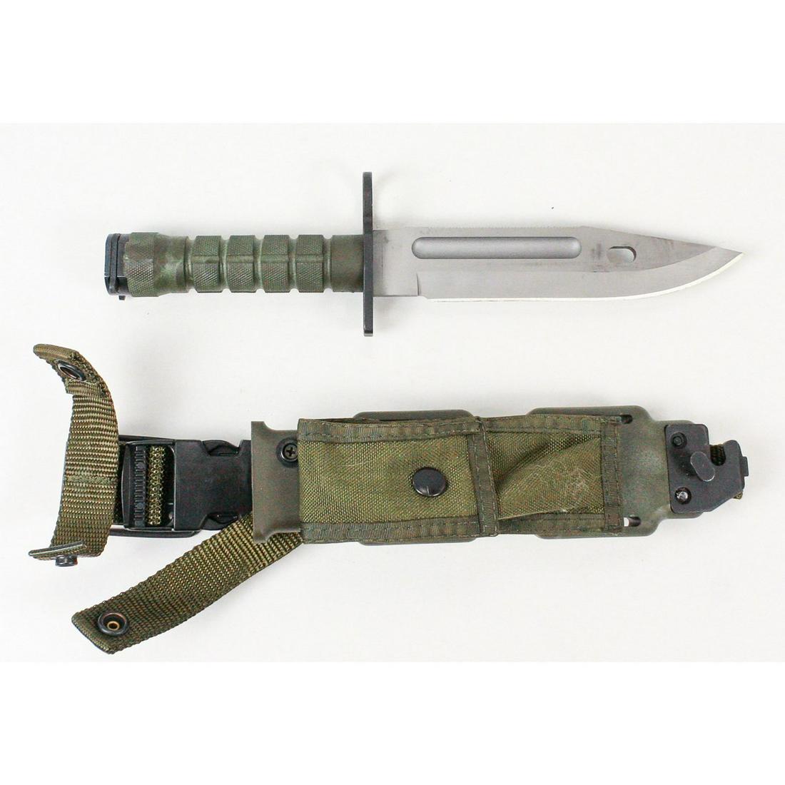 US M9 Phrobis III Bayonet: Marked by previous owner from 82nd Airborne with time in Saudi Arabia and Iraq dating to Operation Desert Storm on inner flap. Bayonet in excellent condition with scabbard and hanger.