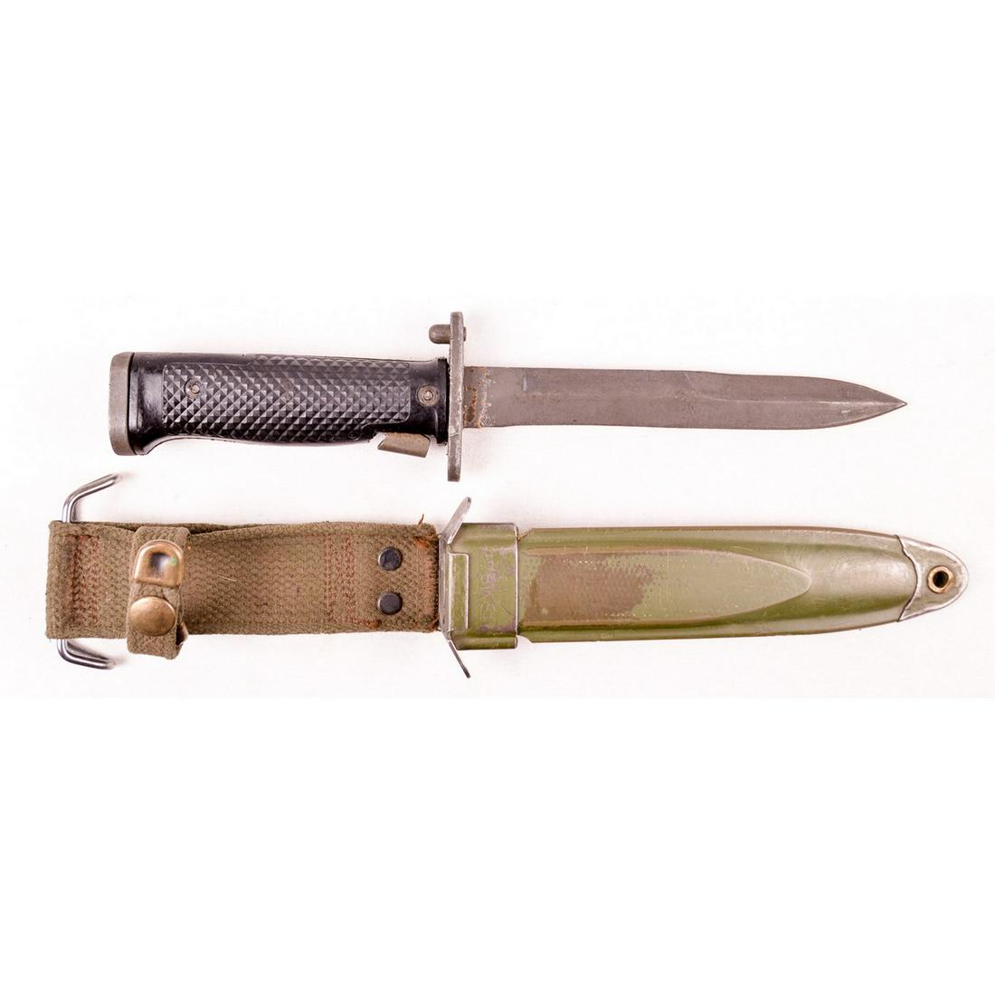 US M5 Bayonet with M8A1 Scabbard: US M5 bayonet with M8A1 scabbard and canvas frog. Crossguard is marked "US M5A1 - Aerial". Black plastic grips are free of cracks, locking button works as intended, blade has sharp point and edge. Bla