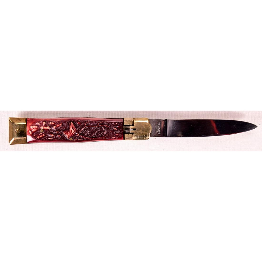 Vintage Lever Action Switchblade: Deer on handles. Stainless steel tang stamp. Very good condition, works well.