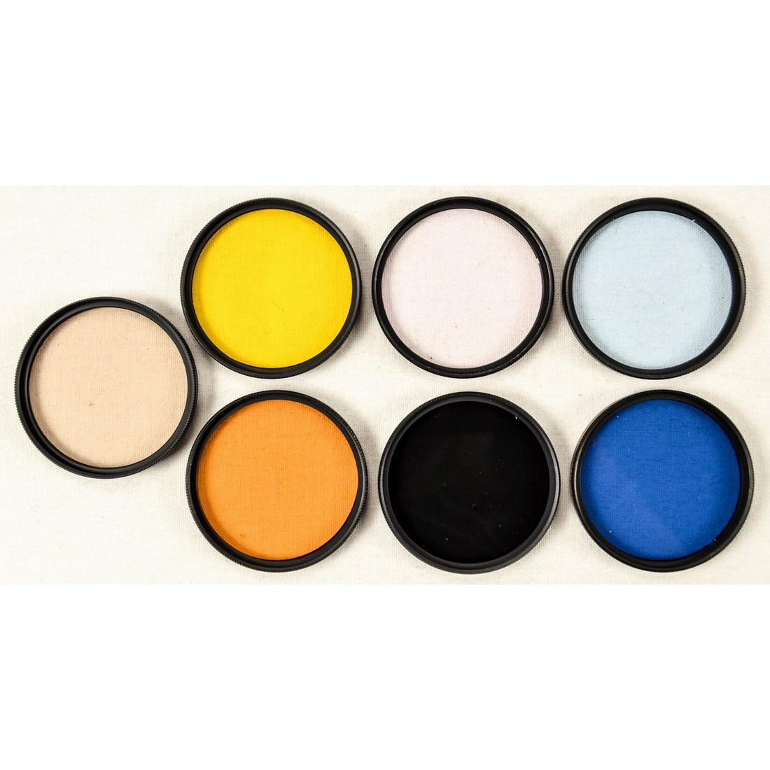 Nikon Lot of 7 52mm filters: Excellent shape in individual cases. See photos