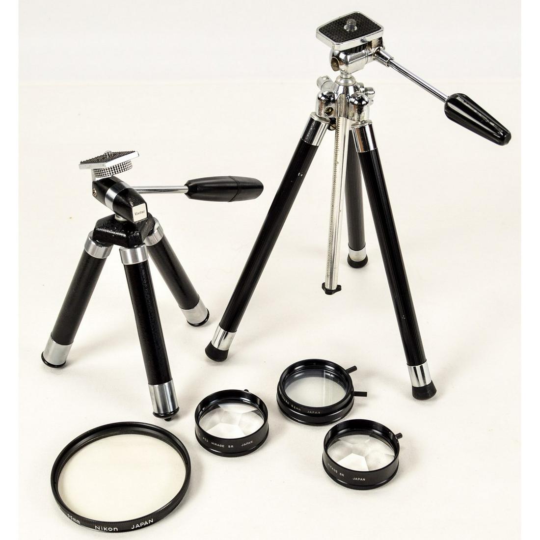 Vintage Mini Tripods & Lenses (6)*Rare item: Includes: Vivitar 6" mini telescoping tripod Vintage tabletop tripod Prinz Mirage Prism Lens' - 5&6 Kalt variable cross 52mm lens Rare, mint Nikon 95mm L39 lens in original leather case. See photos