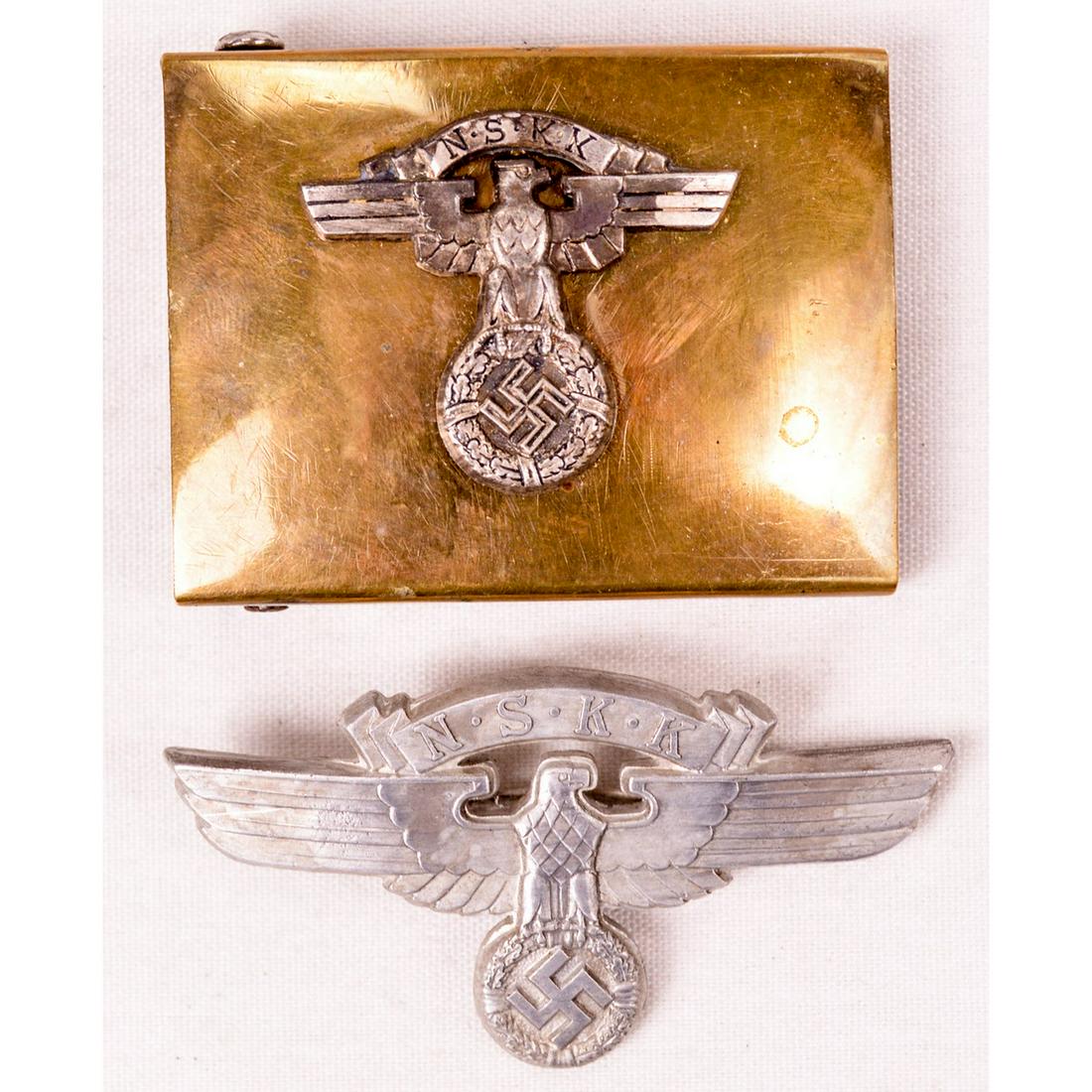 WWII German Nazi NSKK Belt Buckle and Visor Eagle: WWII German Nazi NSKK (transport corp) belt buckle, maker marked "RZM", and rare NSKK visor hat eagle, marked "M1/102 RZM". Very good condition.
