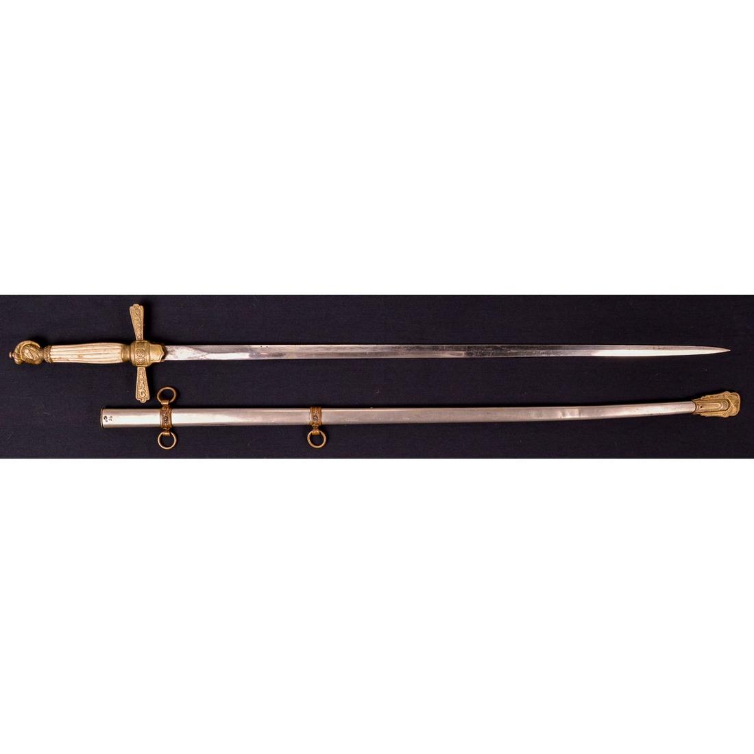 Knights of Columbus Dress Sword W/Scabbard: A fraternity sword for the Knights of Columbus. Straight sword blade measures 28" in length with some oxidation and a spot of minor rust. Blade edge has a few nicks with blunted tip. Some discoloratio