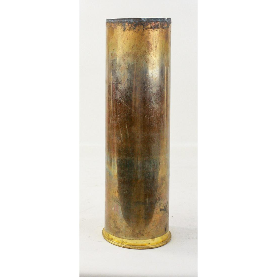 WWII US M14 105mm Shell Casing: WWII US M14 105mm shell casing. Markings on bottom including "USAF USE ONLY". Shell has about 90% of the brass coloring still present. Good condition, see photos. Measures 14 3/4"T x 4 3/4" in diamete