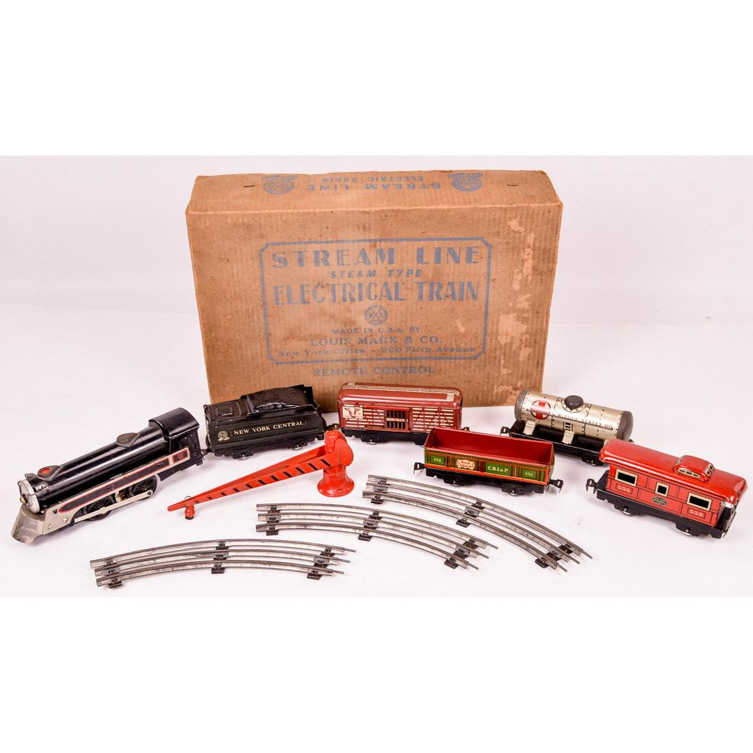 Louis Marx Streamline Electric O Gauge Set: Includes transformer, locomotive, tender, hopper, cattle car, caboose, 6 curved pieces of tracks and 2 straight tracks. Comes in the original box. Set may be missing 2 curved tracks. Good condition. S