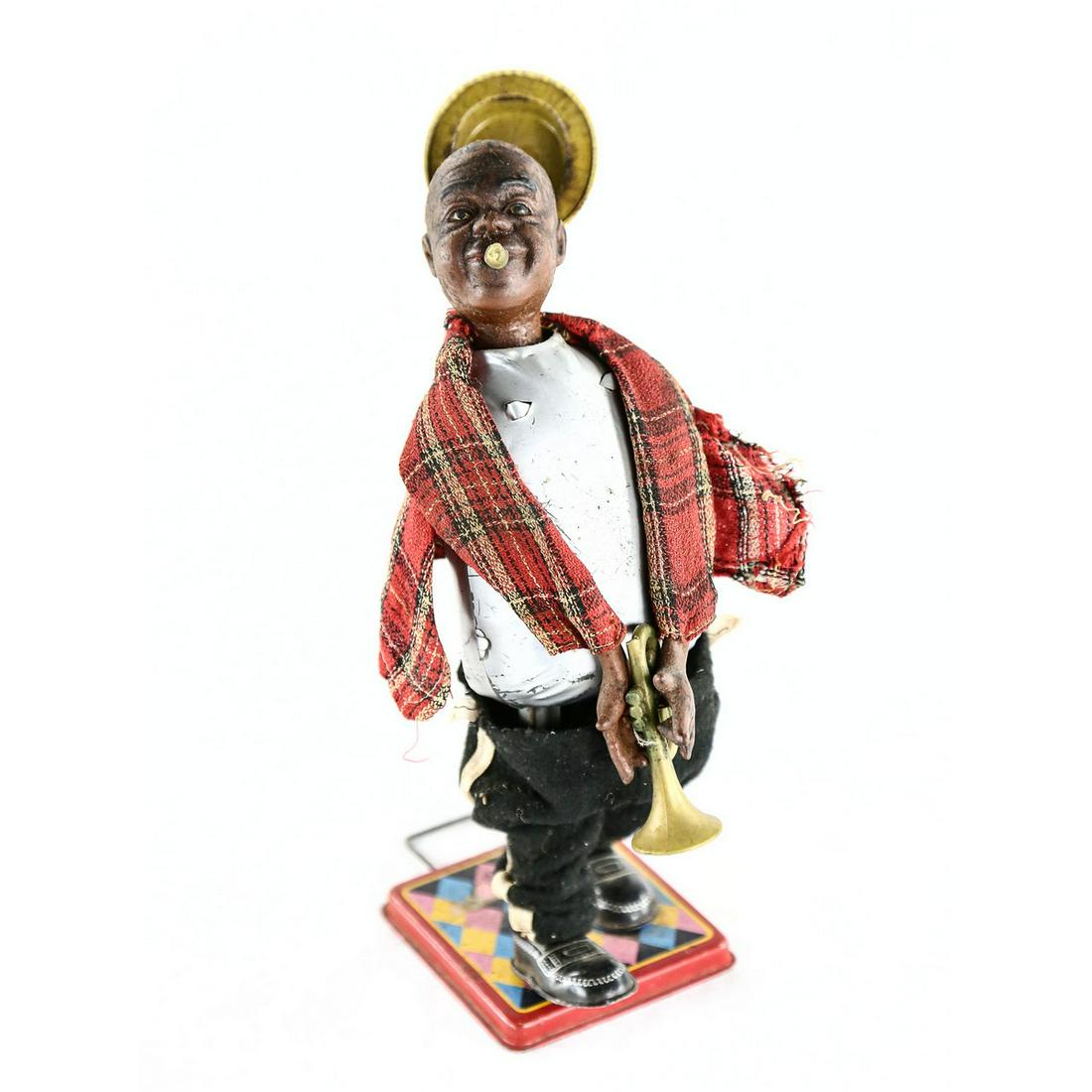 Louis Armstrong Trumpet Player & Other Toys (3): Louis Armstrong Trumpet Player & More. Wind up, does work, needs lots of repair. Also includes a battery operated fishing bear, includes the fish and pond. Also includes a battery operated gorilla tar