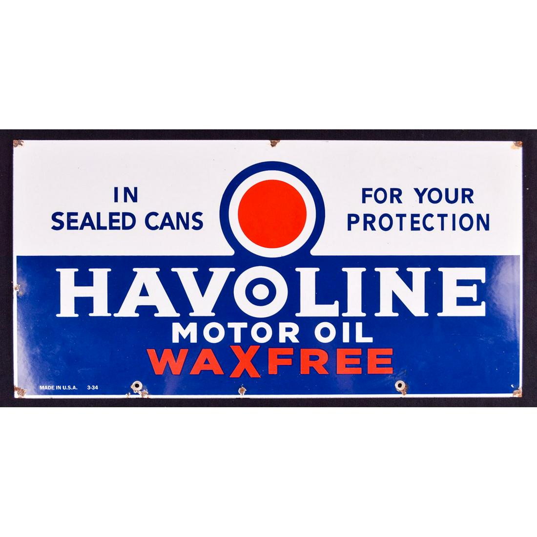 Havoline Motor Oil Sign: This is a Havoline Motor Oil Sign. It is in very good condition. The colors are still vibrant despite showing some signs of use. There is slight rusting at the hanging holes and in paint chips at corn