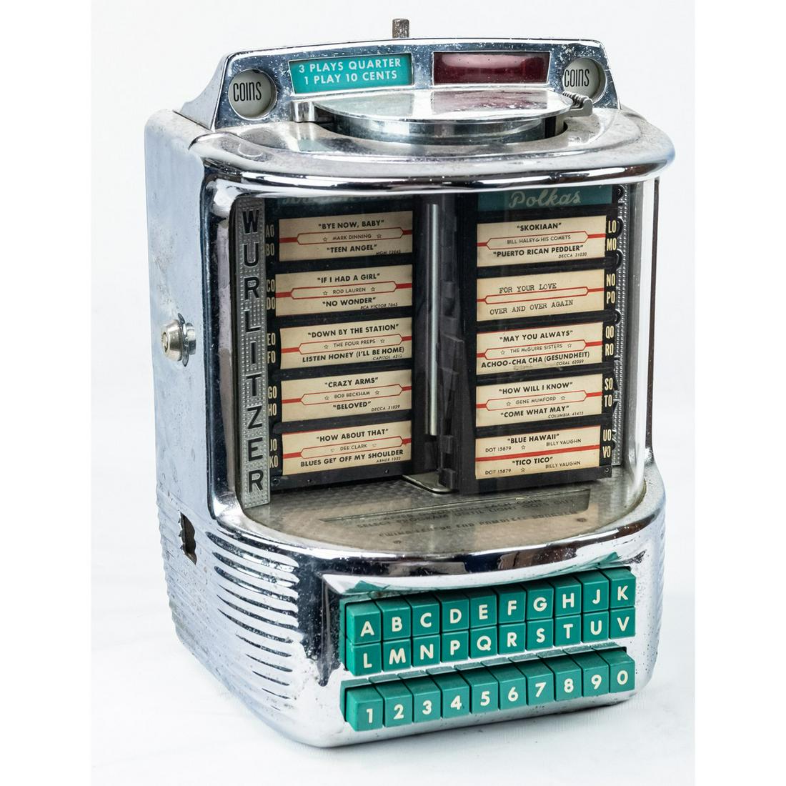 Wurlitzer 5250 Wall Box: Wurlitzer 5250 200 selection wall box. Includes key to open the front. Overall a nice mid century jukebox. See photos. Measures 11"W x 14"T x 8"D.