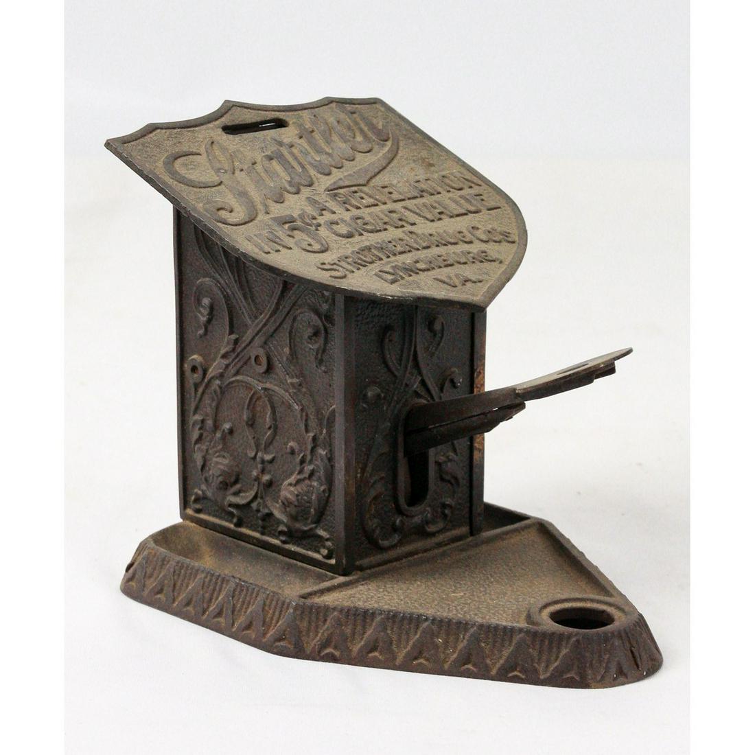Strother Drug Co. Cigar Cutter: Startler cigar cutter box made by Strother Drug Co. The small handle has a blade that would help cut a small cigar. "A revelation in 5 cent cigar value" as it says. Made from cast iron and cuts well.
