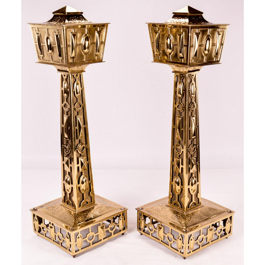 Pair of Vintage Brass Ornamental Stands: Matching pair of vintage custom made brass stands. These stands have a one of a kind design made from brass with a second metal on the inside. The base of each stand is hollow and exposes the screws, 