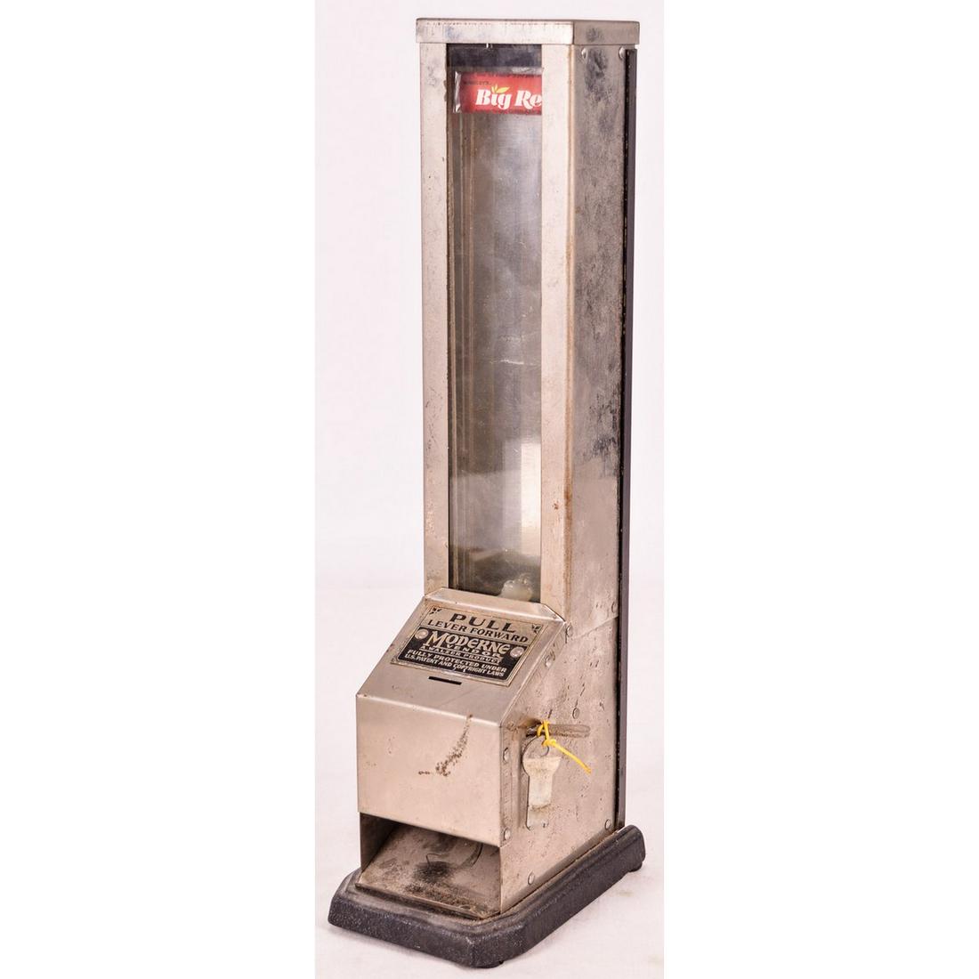 Walzer Product Moderne Vendor 1 Cent Gum Machine: A Moderne Vendor 1Cent gum machine made by A. M. Walzer Minneapolis, Minn. Machine has coin slot on lower half of machine and operates by lever on right side. No decal present on glass. Machine does n