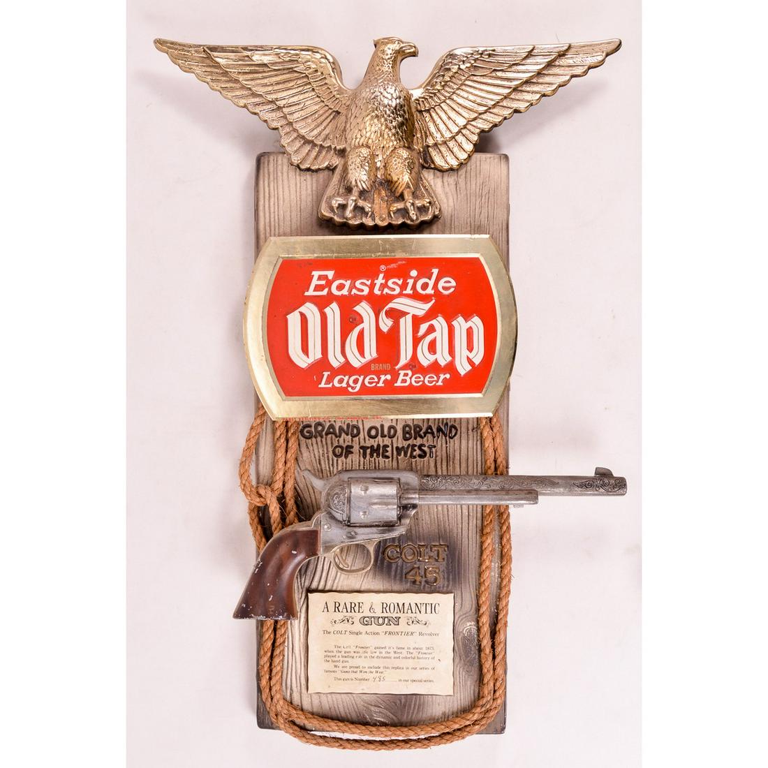 Eastside Old Tap Lager Beer Colt Advertising Sign: A large display for “Eastside Old Tap Lager Beer” with a mounted dummy of an iconic Colt Single Action “Frontier” with a short info panel beneath it. Part of the “Guns th