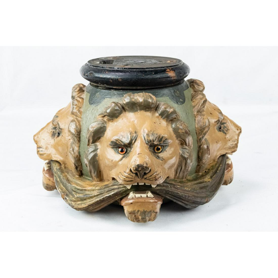 Wooden Lion Heads Bowl/Container: Wooden lion head container that was used in some sort of carnival game. Lid has 3 prongs that likely would have held onto a target of some sort and sat atop the heads. Item could also hold various ite
