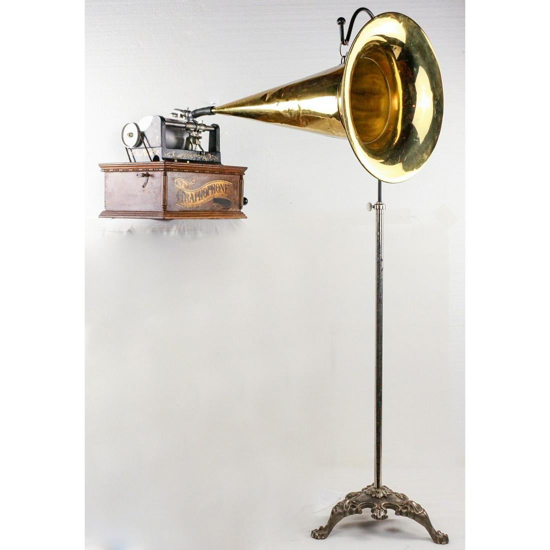 Columbia Type AG "Home Grand" Cylinder Phonograph: This machine has original finish on the cabinet and cover. Has large banner decal with the addition of a Sears Roebuck dealer decal added to tail of banner decal. Banner decal has a few marks and scra