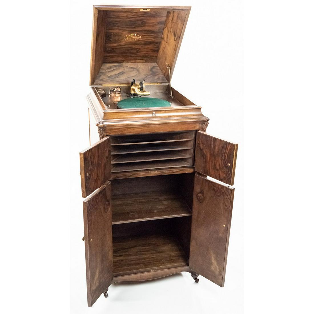 Victrola XVI Circassian Walnut Phonograph: This handsome machine with the highly figured circassian walnut is in overall good original as found condition. The original finish appears to have been lightly varnished over some time ago. Few minor