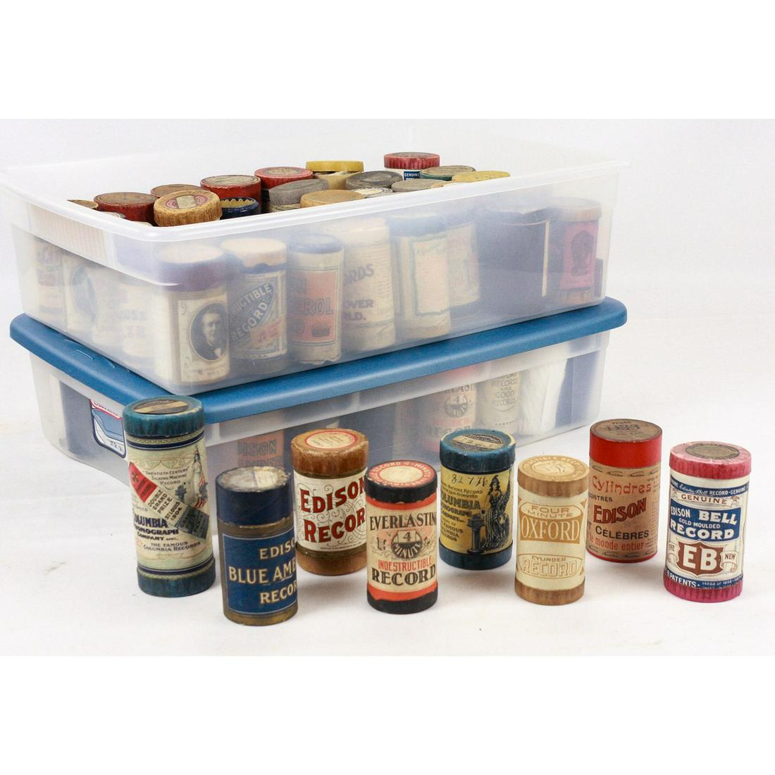 Lot of 85 Cylinder Phonograph Records: Lot of approximately 85 blue and black wax cylinder phonograph records, some are Columbia brown wax, most come in cardboard cases. Various songs and conditions vary from item to item but all appear to