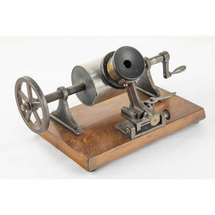 European Tin Foil Phonograph: European Tinfoil Phonograph Original period machine in good condition. Feed screw moves freely. Has original diaphragm and stylus. Wood base measures 6.5” X 9.75” This machine is pictured on page