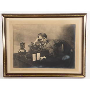 Framed Photo Print of Edison With Class M: Large 14.25" wide X 10.75" tall photo on paper of an exhausted Edison after working on the phonograph for 72 hours straight on June 16, 1888. Framed under glass overall measures 17.25" wide, 13.25"
