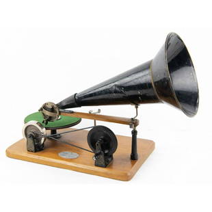 Berliner Hand wind Disc Phonograph: Machine appears to be made from both original and reproduction parts including both wood and metal parts. Nice original reproducer with SN 8591, stamped E Berliner’s Patented Nov 8, 1887, May 7,