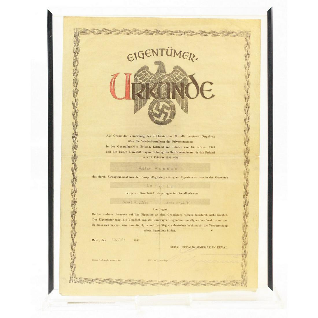 WWII German Framed Urkund Document: See photos Disclaimer: Due to the high quality of Nazi fakes, Donley Auctions has described this item to the best of their ability and assumes NO liability or responsibility if information provided is