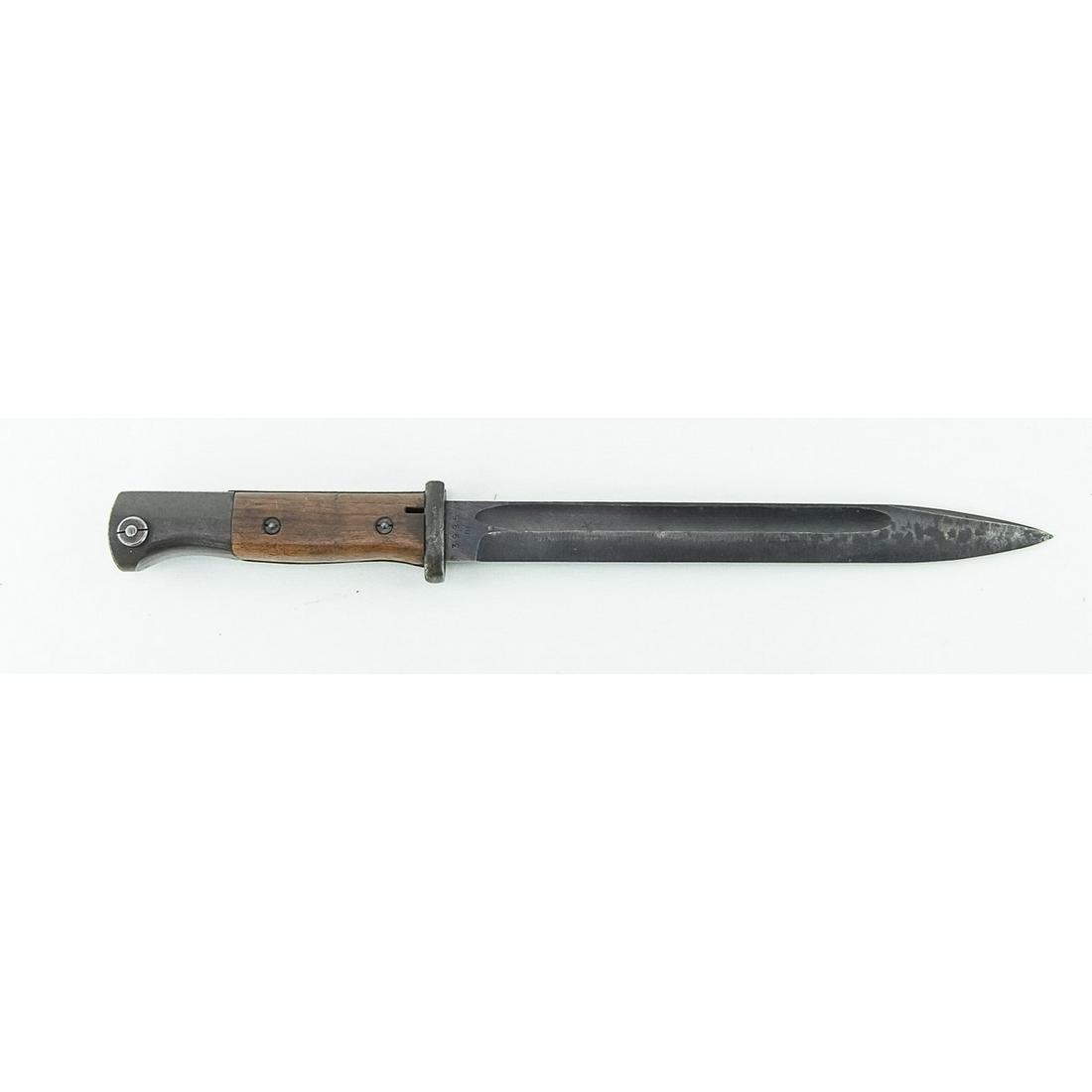WWII German K98k Bayonet: A bayonet for the German K98k made in 1943. 10" blued blade is in very good condition with minor finish wear from scabbard use. Ricasso is marked "cof/43" on one side and numbered "3995/m" on other si
