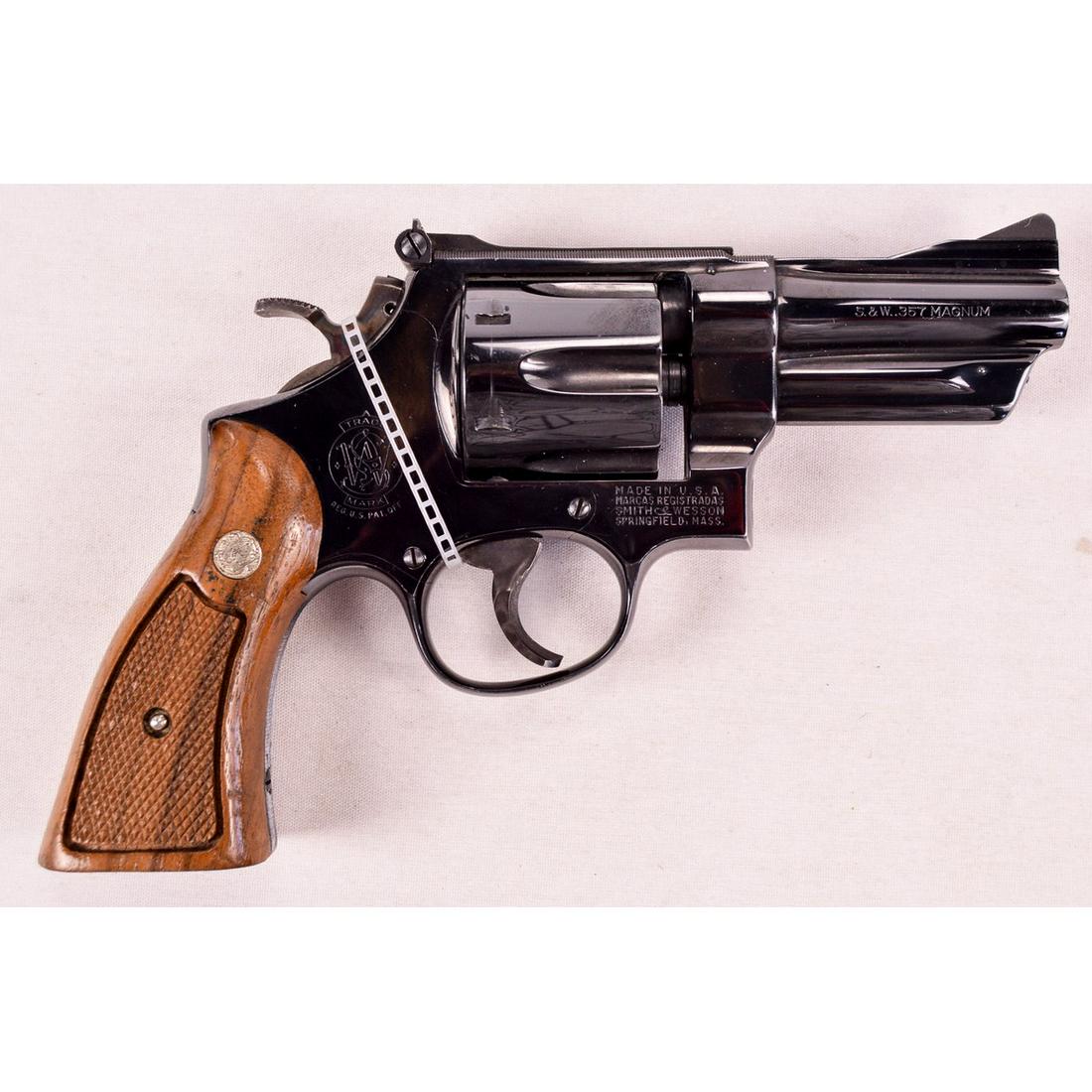 Smith & Wesson Model 27-2 Revolver .357 Mag (C): Rare 3.5" barrel with adjustable sights. Target hammer and trigger. Checkered wood grips. Like new condition. See photos. C&R eligible firearm, requires C&R or FFL for shipping.SN: S282598