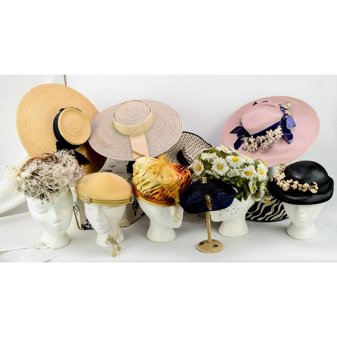 10 Hats from the 1950's-60's: 4 wide brimmed straw hats decorated with grosgrain bows, velvet trim and flowers. Also included is a lemon yellow straw beanie adorned with pearls. Orange and yellow satin bubble hat with a side bow. 