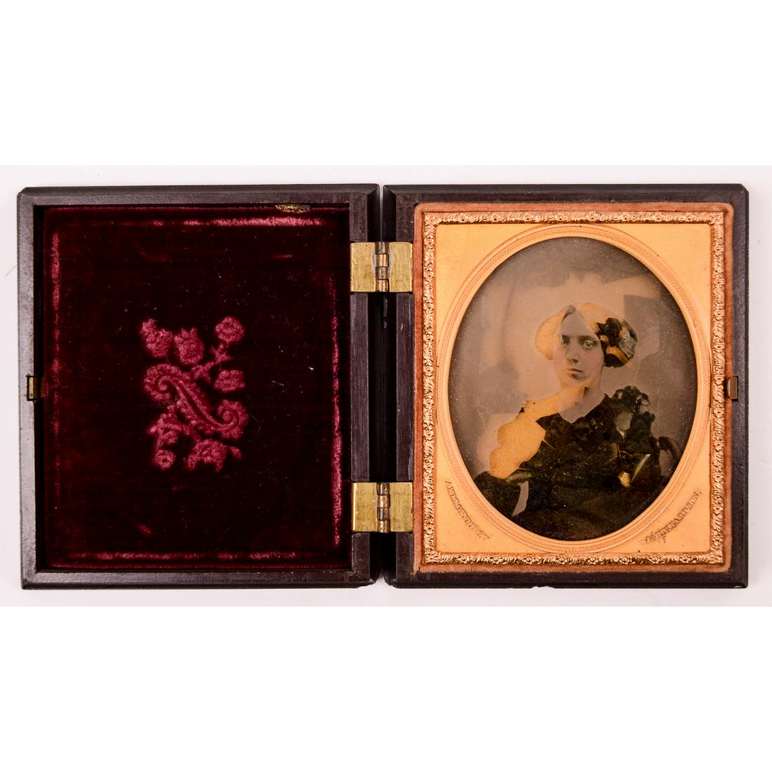 1/6 Plate Cased Ambrotype by V. L. Richardson: 1/6 plate Ambrotype of a woman. The matte is stamped Ambrotype be V.L. Richardson. The image itself is in good condition but the black backing is peeling. Housed in an A.P. Critchlow, "Geometric / Scr