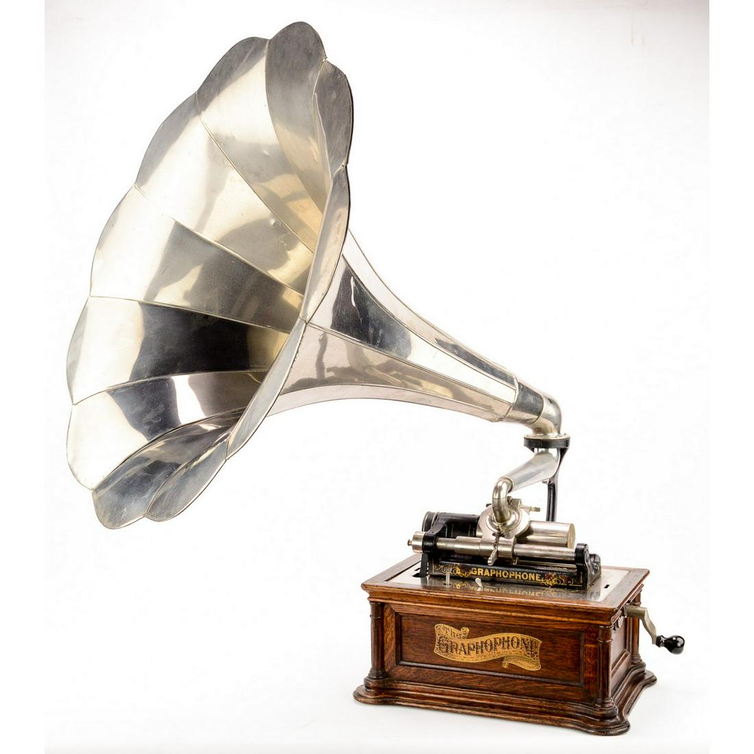Columbia BET Cylinder Phonograph: This impressive machine has its original golden oak finish and decal. This machine has no cover. It has an original Columbia lyric style reproducer with a good four minute stylus. The carriage and man