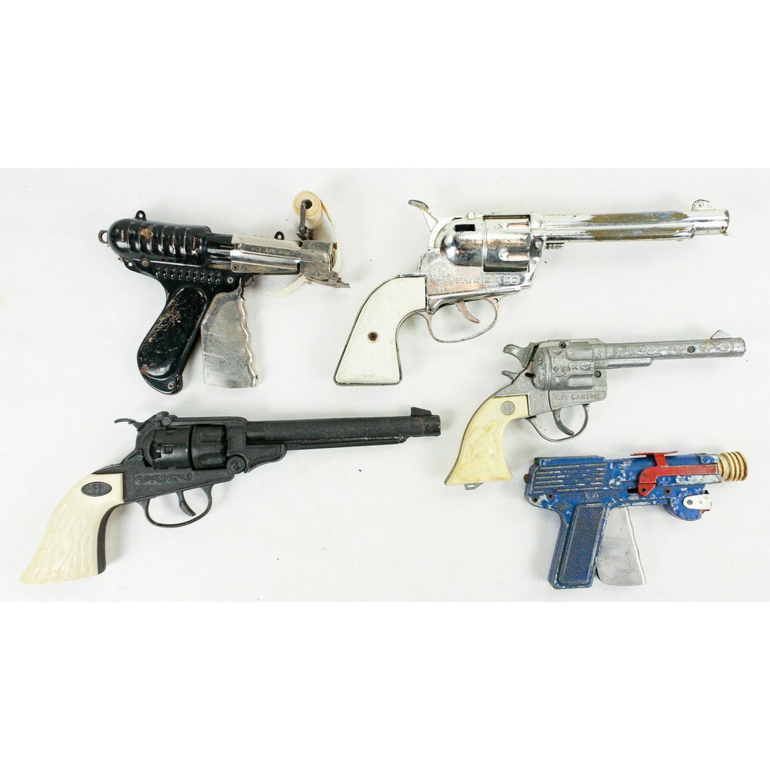 Vintage Cap & Ray Guns: Five vintage cap and ray guns. All different makes and designs. All metal, not plastic. All in good condition. Different sizes. See photos.