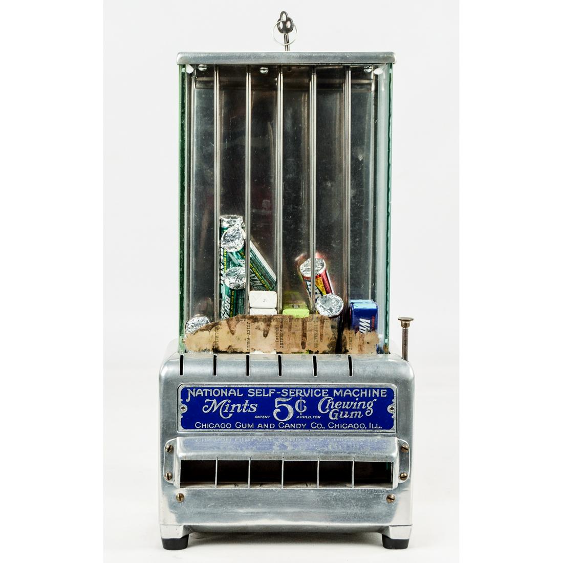National Mint/Gum Vender Coin Op Machine 131: Five cent mint/gum six column machine, has key, good glass, good ID tag, looks to have original back door which has a small tear along the upper locking area which is not noticeable from the front, pa