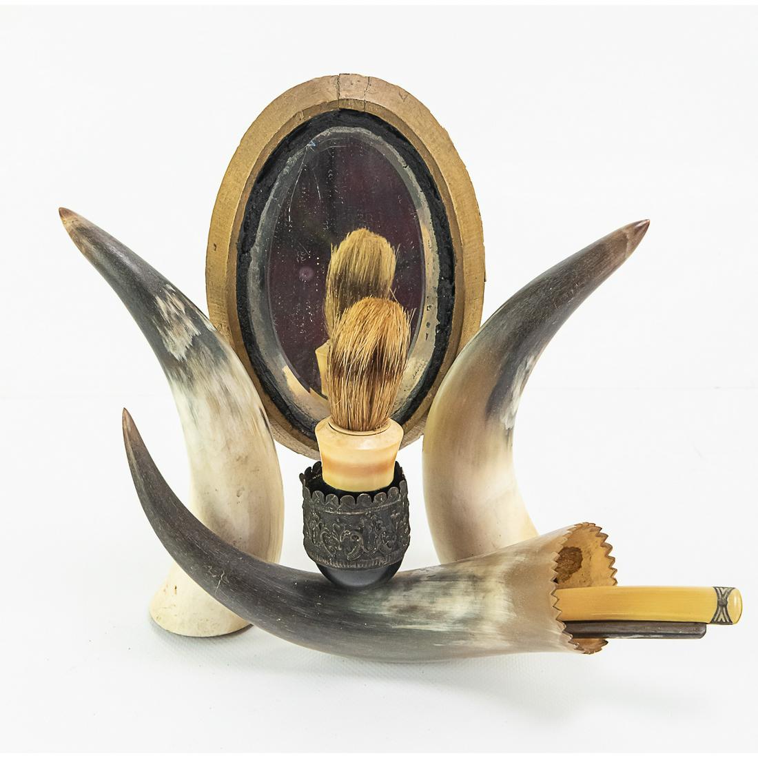 Horn Shaving Set with Brush and Straight Razor: this is a hand-made shaving rack made from cow horns. It has a beveled glass mirror and a razor and shaving brush. The razor is an art deco Sperry and Alexander Centaur straight razor with bakelite sc