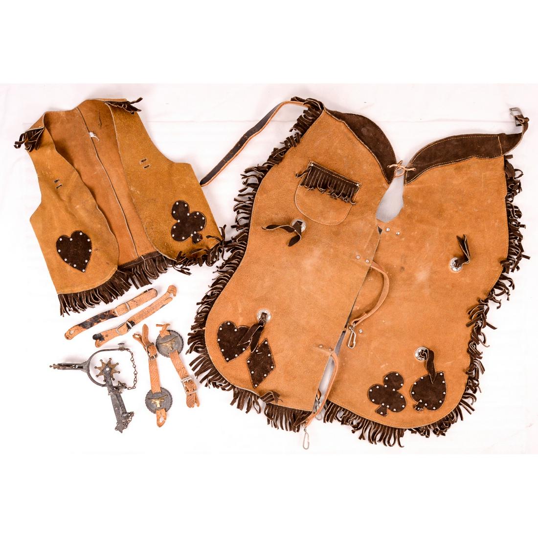 Children's Western Leather Outfit w/Chaps Spurs: Children's Western Leather Outfit with Chaps, Jacket and Spurs. Jacket approx. size 14" T x 12" W. Small leather straps for metal medallions and spurs have some tears. In good condition. See photos.