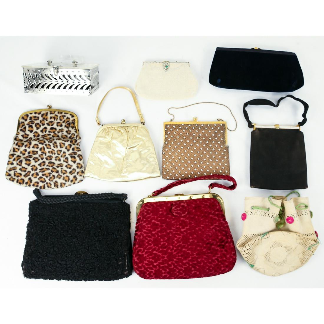 Lot of 10 1950s Ladies Purses: Highlights include clear Lucite top and handle metal purse in excellent condition. Beautiful glass rhinestone covered metal framed purse in very good condition. Exquisite blue velvet clutch purse with