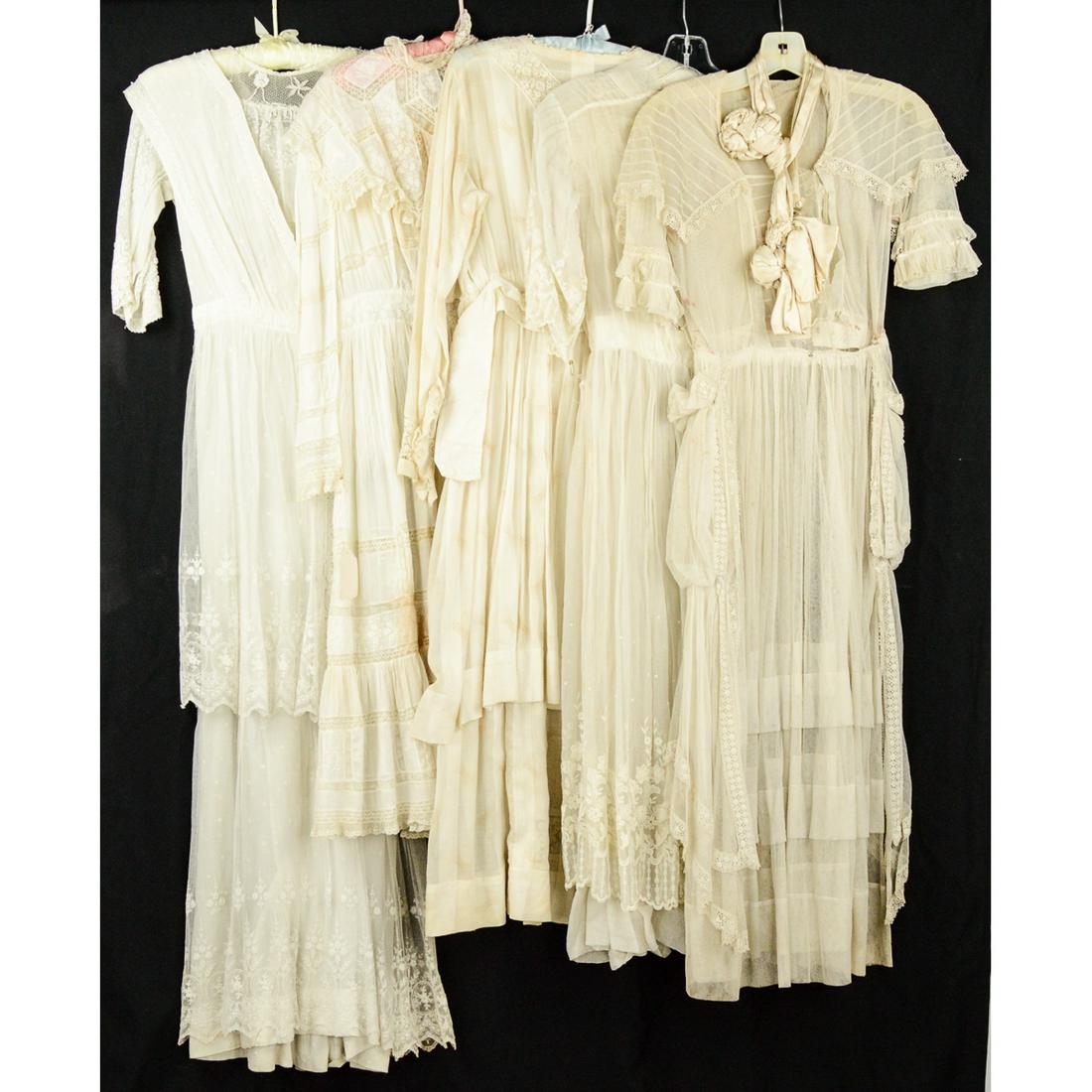 Lot of 5 Titanic Era Ladies White Day Dresses: Incredible amount of lace and gauze is included in this lot of dresses. They are in various degrees of condition. Biggest problem being some rust spots. Fabric is strong. Some include sash belts. Othe