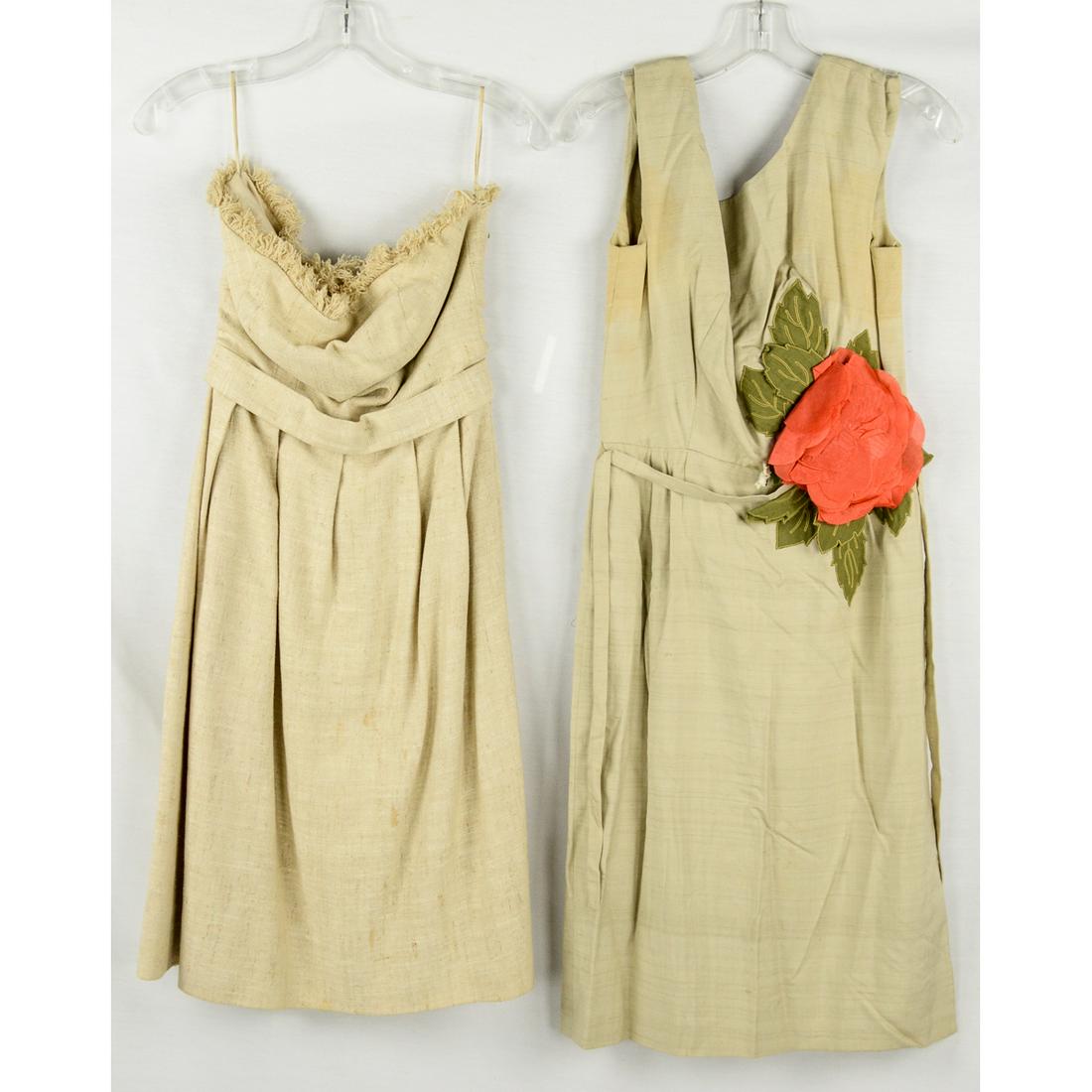 Two 1950s Sheath Wiggle Dresses: Strapless burlap cotton day dress. Fringe neckline, pleated at the waist, attached belt, back metal zipper. Fabric is strong. Dress is completely lined in soft rayon. Excellent condition. Waist size 2