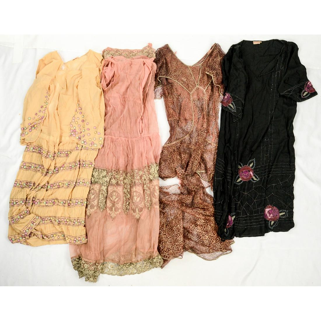 4 1920'-30s Study in Repairs: Copper colored pure lace dress. Originally had silk lining sewed to it. The lining is now deteriorated. Can be repaired. Top and bottom are separating. Thread is shiny silver. In poor condition. Pink 