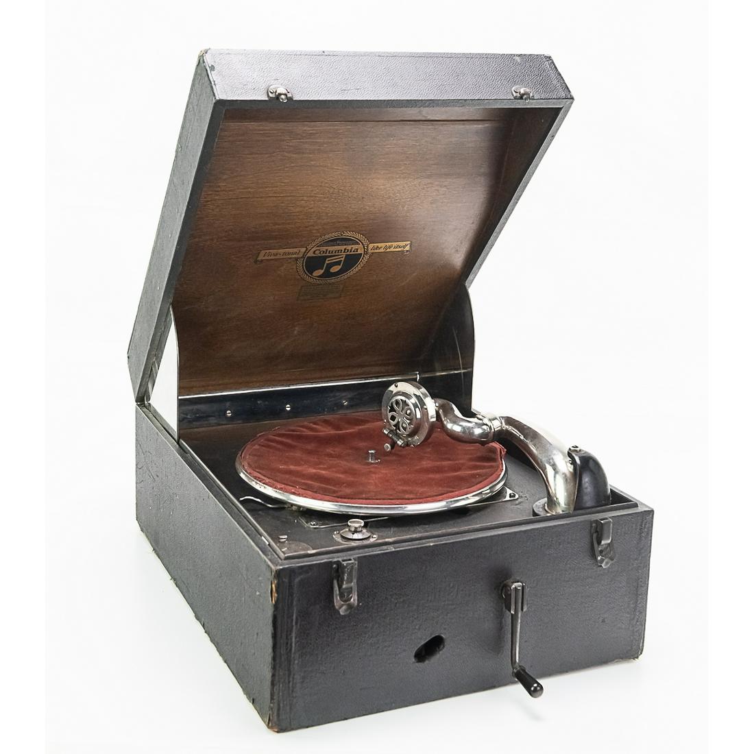 Columbia Model 160 Portable Viva-Tonal Phonograph: Columbia Model 160 Portable Viva-Tonal Phonograph. 17 1/2" L x 13 1/4" W 7 3/4" D. Has record storage with 3 records. In good working condition. See photos.