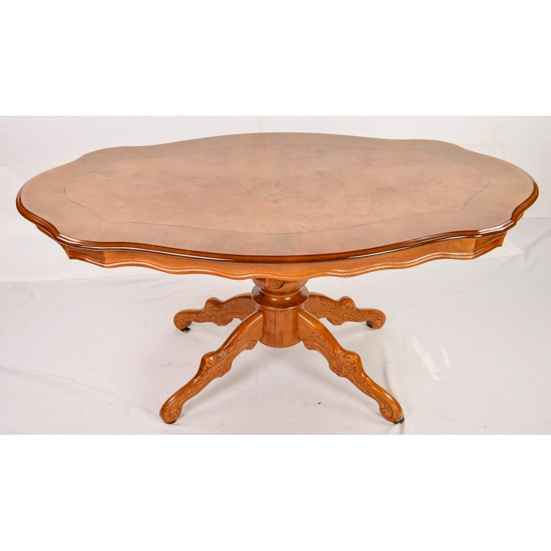 Figured Wood Coffee Table: Nicely Figured Wooden Coffee Table. 47" Length by 22" Tall by 27" Depth. Burl Maple look. In good condition see photo's