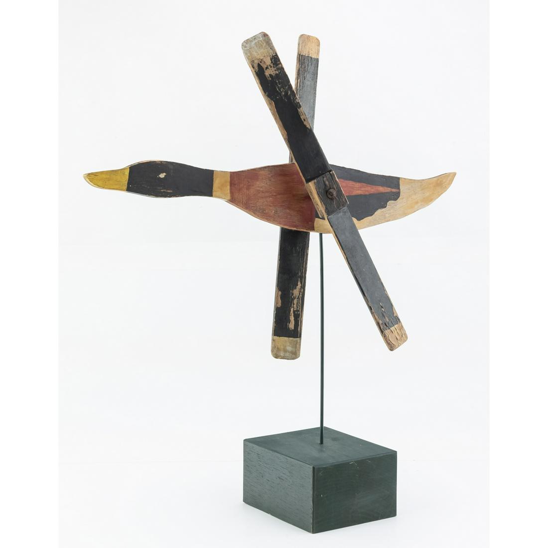 Hand Crafted Mallard Duck Whirly Gig: A great piece of traditional Americana. This whirly gig has some paint loss due to use, giving it a wonderful rustic appeal. It measures 19"W x 21 3/4" H.