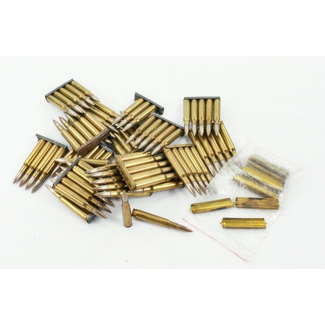 WWI 1918 Dated .30cal Ammo in Stripper Clips 28Pcs: This lot includes 80 rounds of 1918 dated .30cal ammunition in 16 clips, plus 12 empty Brass Stripper Clips.