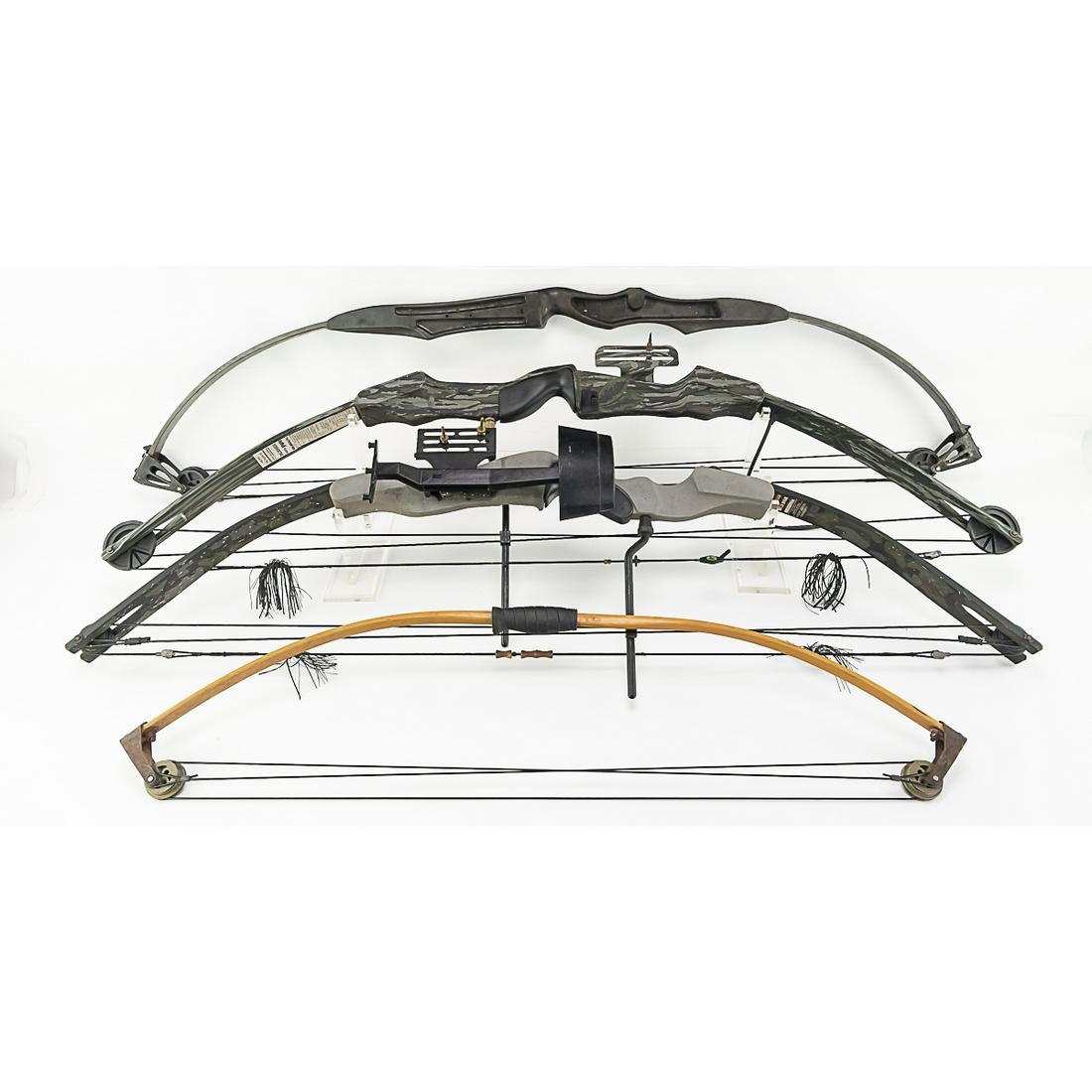 Compound Bows Adult and Youth 4Pcs: This lot includes a Pearson compound, youth compound, a Bear Black Panther re-curve, and an Intermediate compound bow.