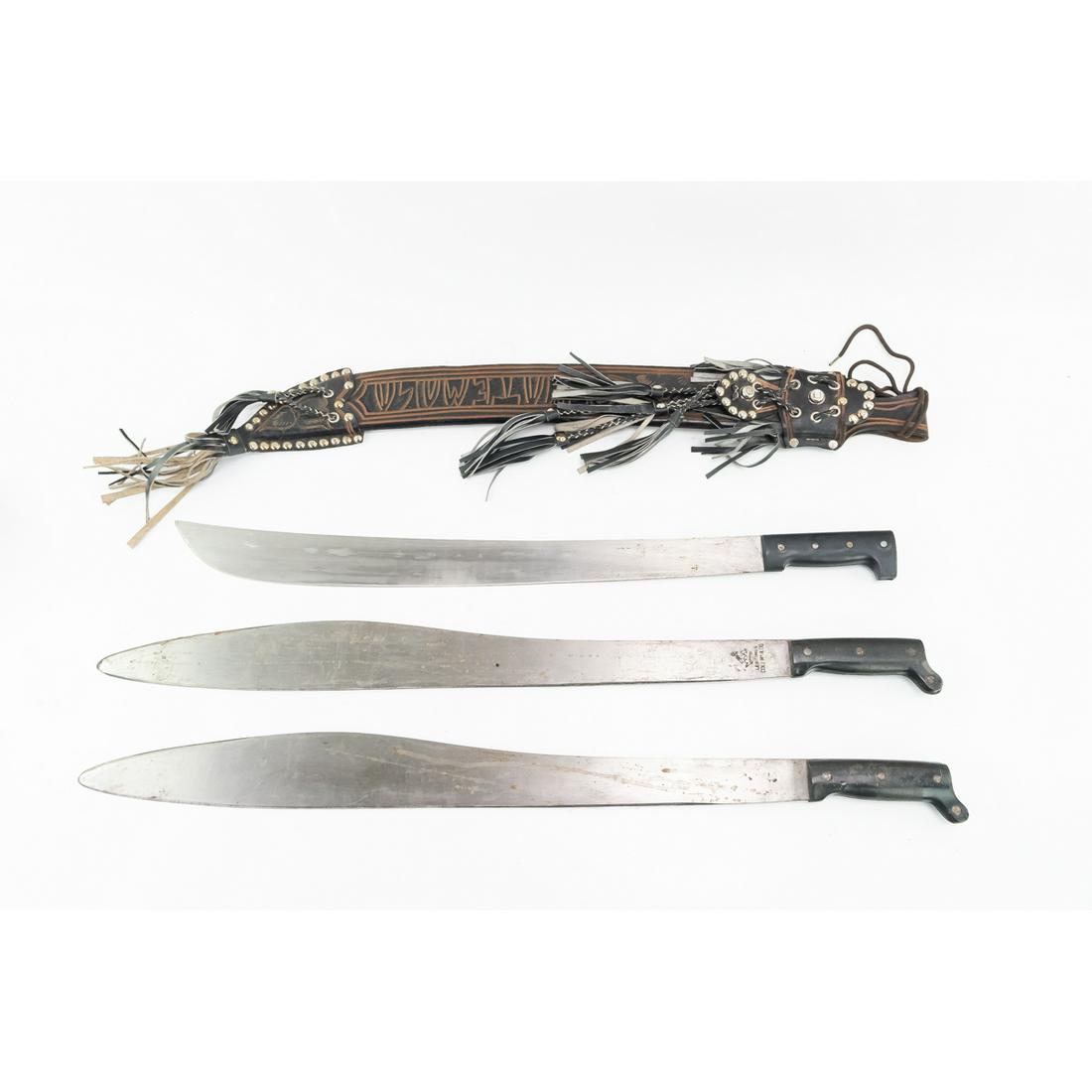 3 Machetes: 3 piece lot includes 2 Collins & Co. Legitimus machetes, one bad stamp, with no scabbards measuring 32.5" long each, and an unmarked machete in a decorative leather scabbard measuring 29,25" long in g