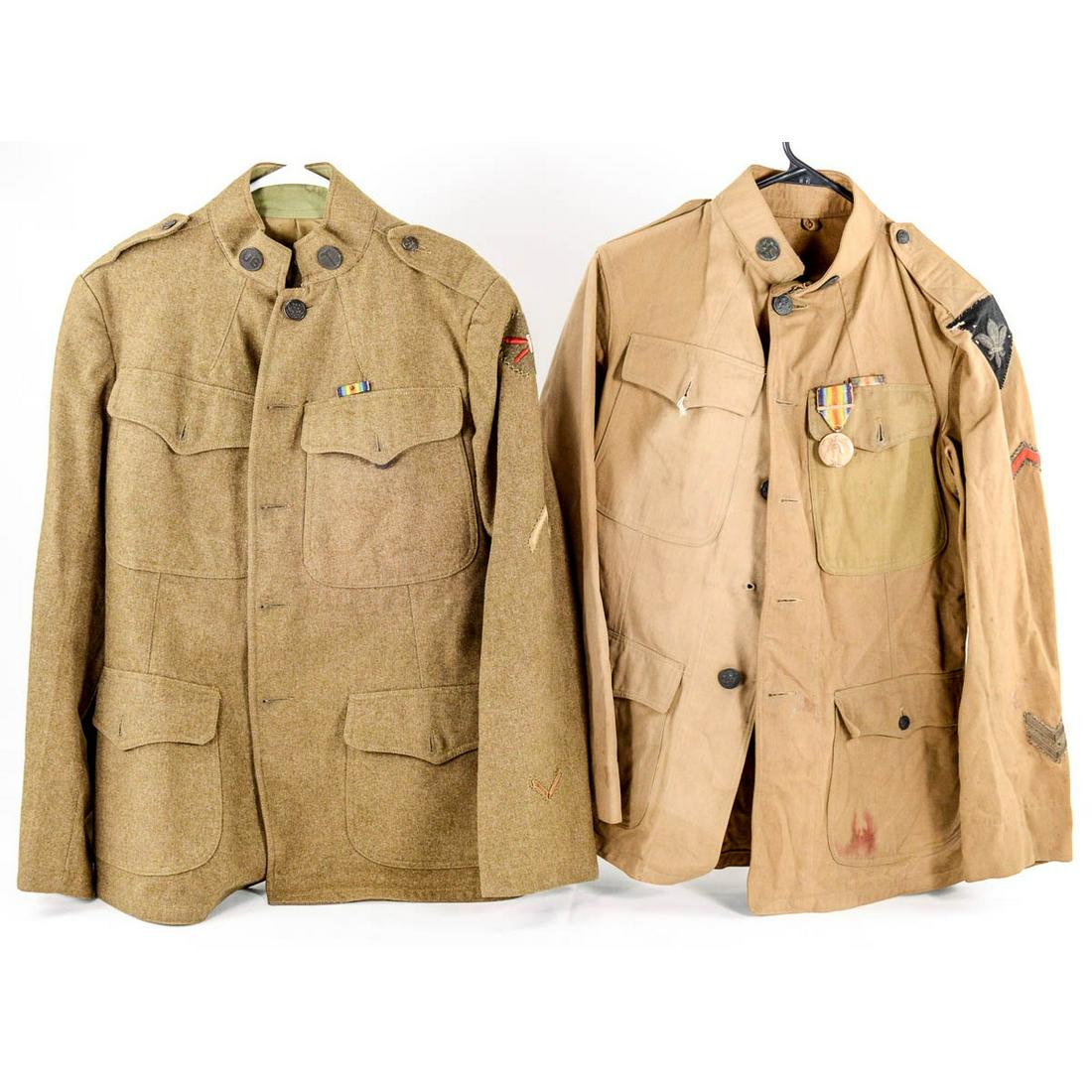 WWI US Wool and Summer Tunics w Patches 2Pcs: Includes wool tunic with embroidered Coastal Artillery patch, service stripe, and Transport Corps and US collar discs. The other tunic is a cotton summer tunic with a bullion District of Paris patch,