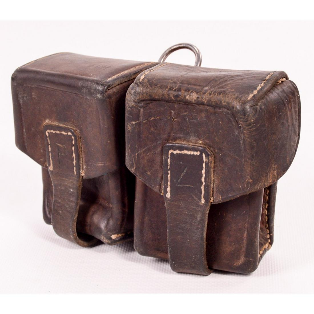 WWI German Leather Cartridge Dbl. Pouch Identified: WWI German Leather Cartridge Double Pouch. 4 1/2" T x 7" W x 2" D. Leather is supple. Condition good. Initials scratched into the front leather. P. Z. See photos.